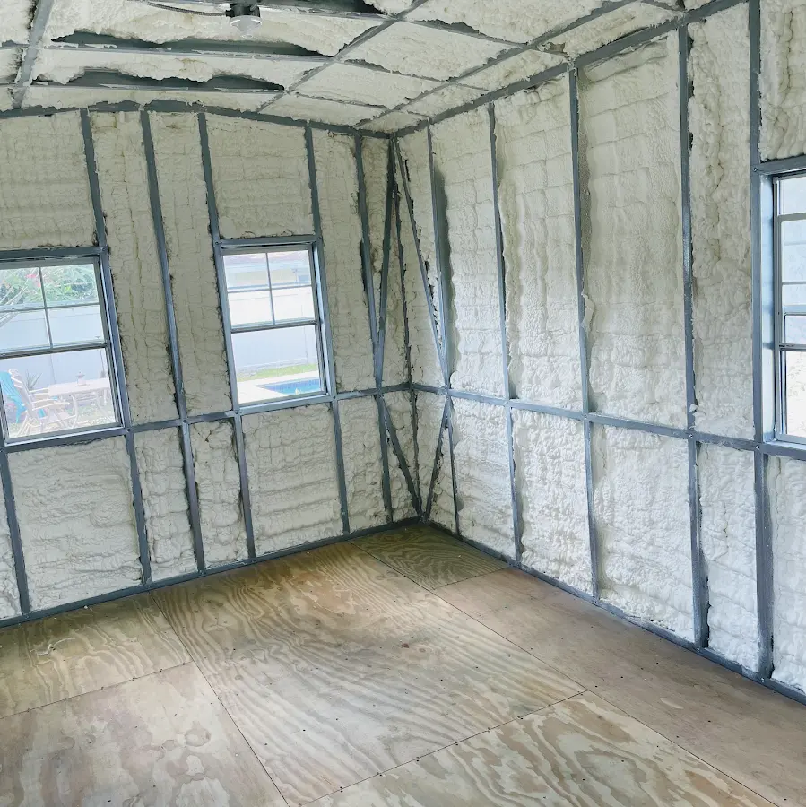Closed-cell spray foam insulation applied to wall cavities in a residential project in Baltimore Highlands
